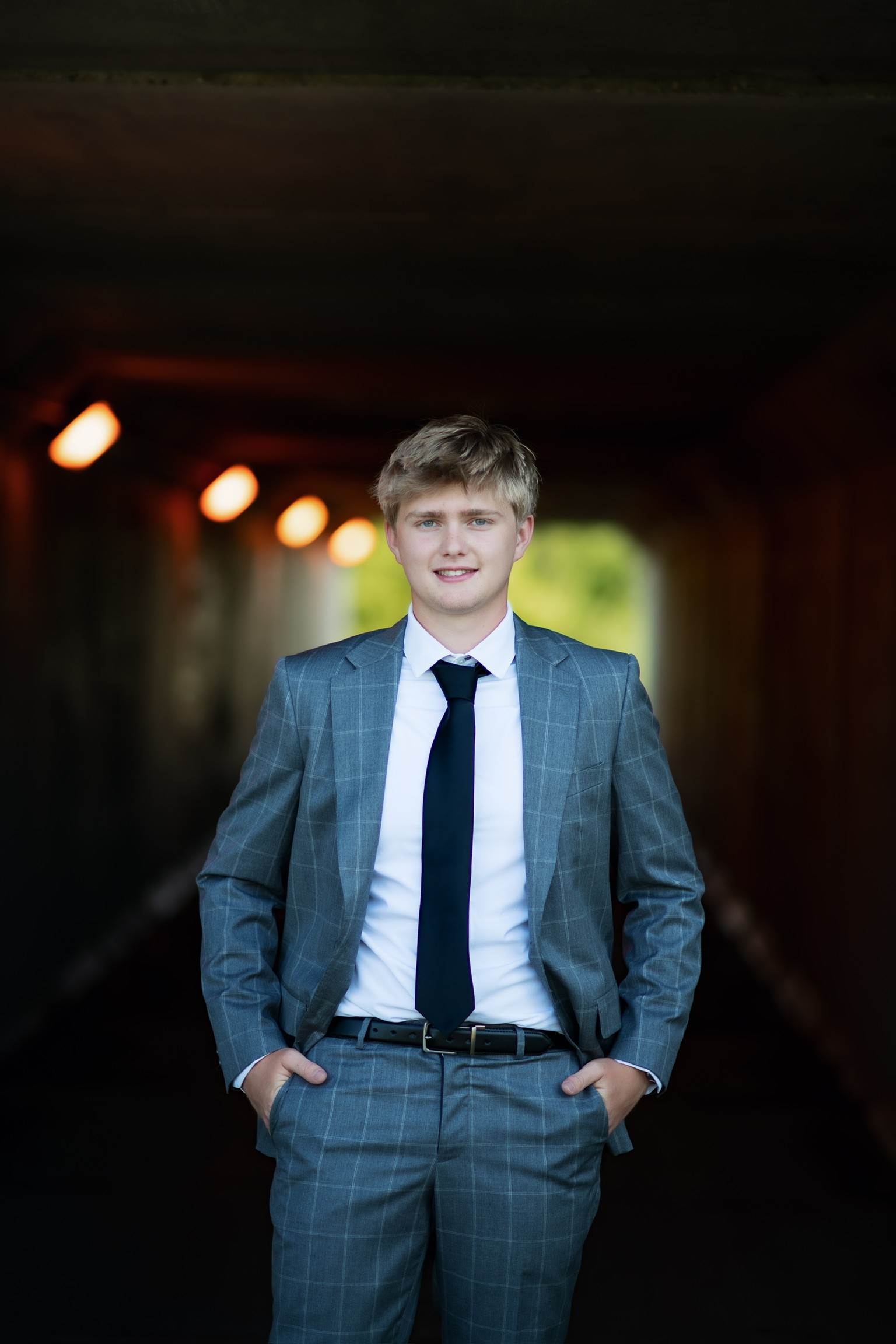 Young man in navy blue suit